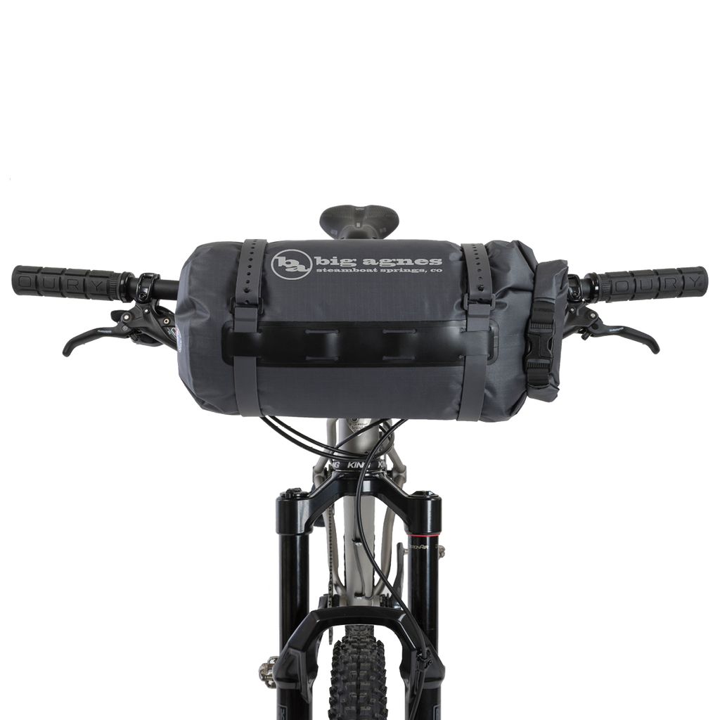 Bicycle with handlebar bags on a white background