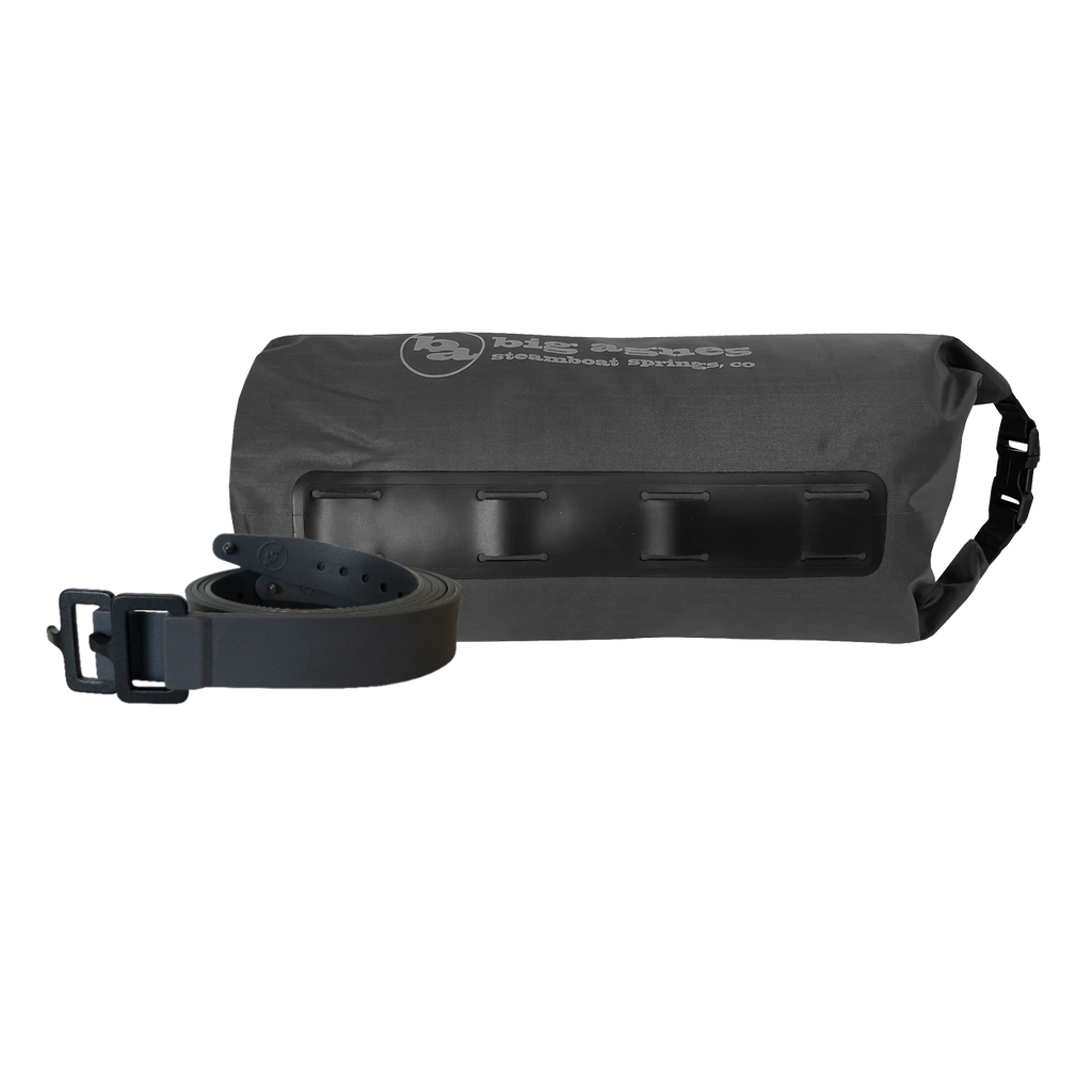 Black dry bag with strap on a white background
