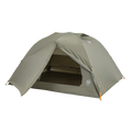 The Big Agnes Blacktail 3 - Vetiver is a green, dome-shaped, lightweight backpacking tent with orange guy lines. Shown with its open entrance revealing the interior floor and mesh door, it’s set against a plain white background.