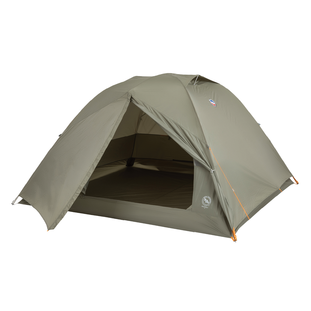 The Big Agnes Blacktail 4 - Vetiver is a green, dome-shaped lightweight backpacking tent with an open front door showing the interior, orange corner guylines, and is set up against a plain white background.