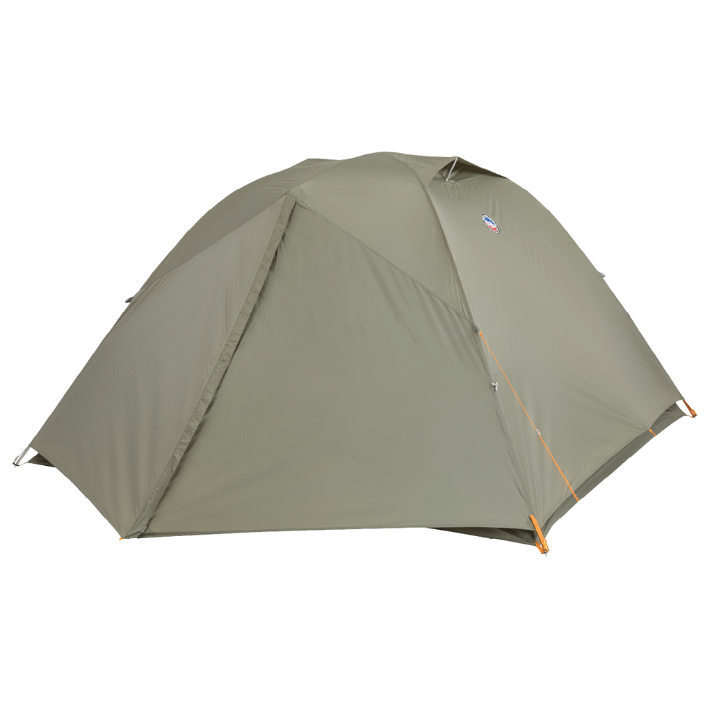 The Big Agnes Blacktail 4 - Vetiver is a green, dome-shaped camping tent with full rainfly coverage and orange accents at the corners and zippers, shown set up on a plain white background.