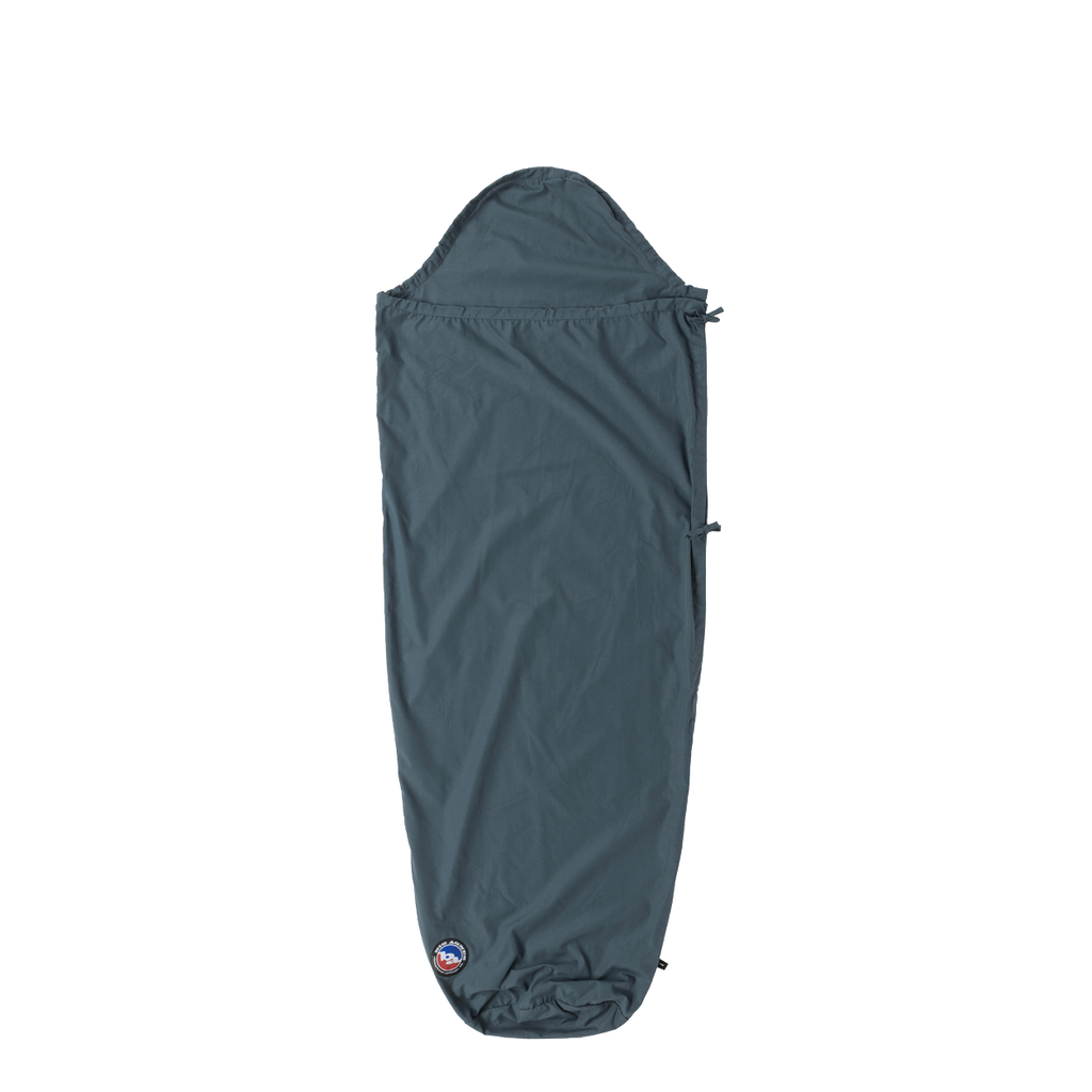 The Big Agnes Cotton Sleeping Bag Liner is shown in gray with a hood, full-length, and tapered design against a white background, featuring the logo near the bottom—perfect as a travel companion for your sleeping bag.