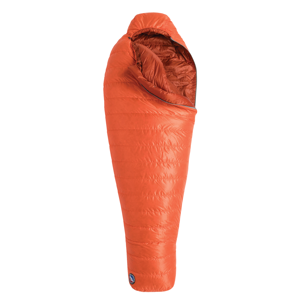 The Big Agnes Returns Greystone 20° is an orange, mummy-style sleeping bag with a hood and DownTek insulation, designed for warm backpacking trips, shown upright against a white background.