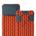 Orange and blue camping mattress on a white background