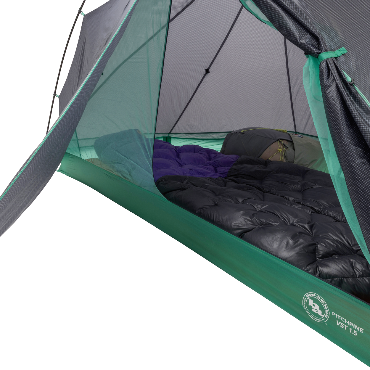 A close-up of the Big Agnes Returns Pitchpine VST 1.5 tent interior reveals two sleeping bags side by side on the floor, with mesh sides and a partially open door in this ultralight green and grey shelter.