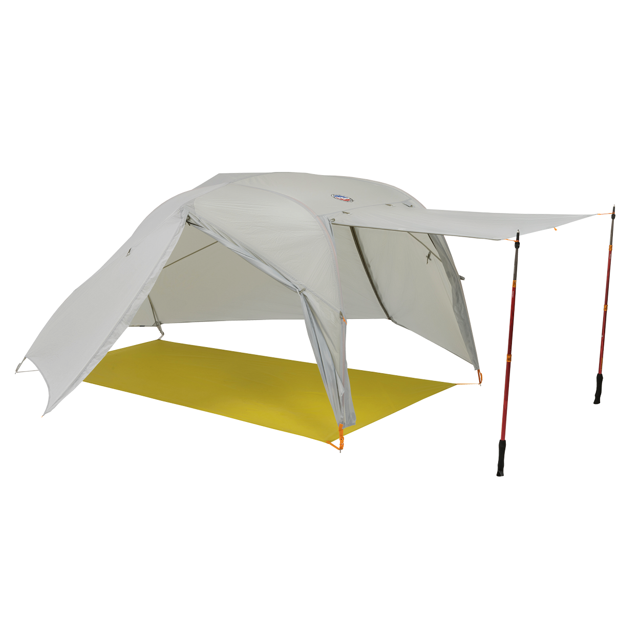 The Big Agnes Salt Creek 2, a light gray backpacking tent, is shown with one side propped open by trekking poles for an awning and panoramic views, set up on a bright yellow groundsheet.