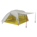 The Big Agnes Salt Creek 3, shown in yellow and gray on a white background, is a backpacking tent with a spacious interior, large rainfly with extended awning supported by two trekking poles, and mesh windows for panoramic views.
