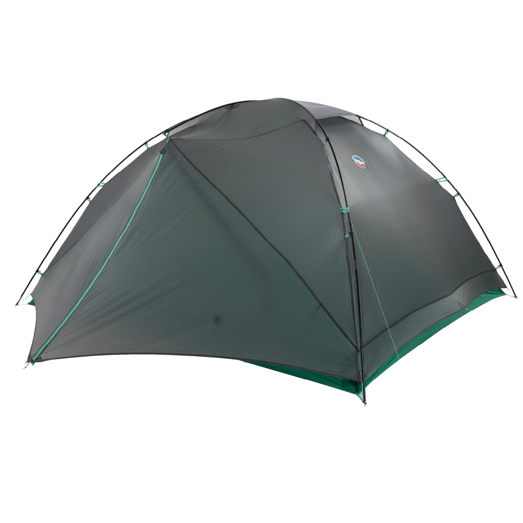 A dark green, dome-shaped Big Agnes Sarvis VST 2 tent is pitched on a plain white background, showcasing its rainfly and supporting poles for a reliable ultralight shelter.