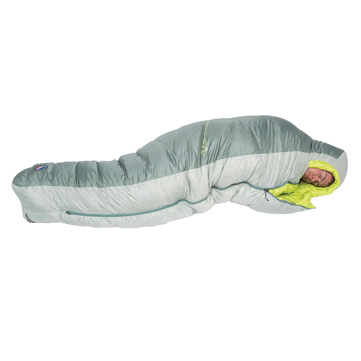 A person is sleeping inside the Big Agnes Returns Sidewinder 0˚, a light gray and lime green mummy-style side sleeper sleeping bag with body-mapped insulation, fully zipped and snug around them, as they rest on a white background.