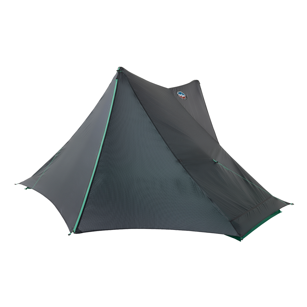 The Big Agnes String Ridge VST 1.5 is a dark gray, single-pole, pyramid-shaped ultralight tent with green-trimmed seams that stands out against a plain white background.