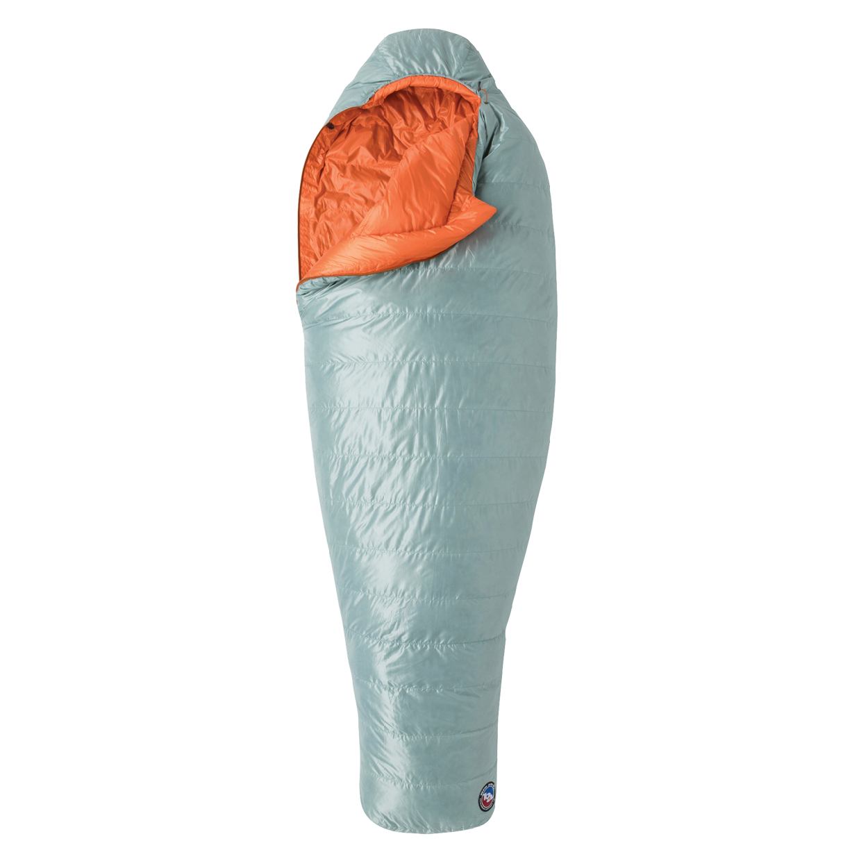 The Big Agnes Returns Women's Greystone 30° sleeping bag in light blue, featuring DownTek insulation, stands upright against a white background. Its mummy-style hood is slightly open, showing the bright orange interior lining.